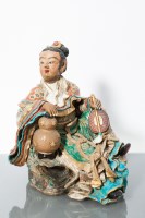 Lot 327 - LARGE CHINESE STONEWARE FIGURE the reclining...