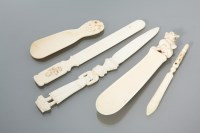 Lot 341 - CHINESE IVORY LETTER OPENER AND TWO SHOE HORNS...