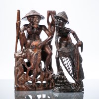 Lot 380 - TWO CHINESE WOOD CARVINGS each of fisherman,...