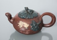 Lot 440 - YIXING TEAPOT with fish and frog motifs in...