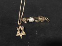 Lot 14 - FIVE GOLD RINGS also a Star of David pendant...