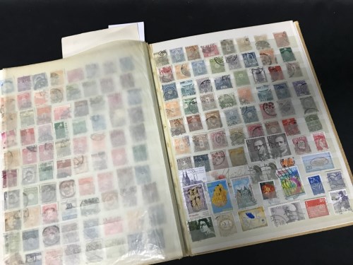 Lot 19 - STOCK BOOK WITH WIDE RANGE OF WORLD STAMPS...