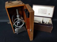 Lot 40 - TWO MICROSCOPES each in wooden case, one...