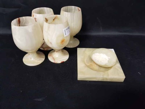 Lot 51 - SET OF FOUR ONYX GLASSES along with an onyx...