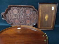 Lot 91 - THREE WOODEN TRAYS including one carved and...