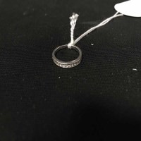 Lot 215 - DIAMOND CHANEL SET RING in platinum