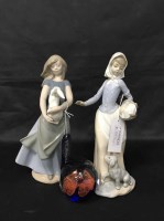 Lot 263 - TWO NAO FIGURES OF YOUNG GIRLS along with a...