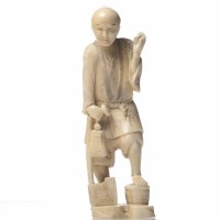 Lot 285 - JAPANESE CARVED IVORY FIGURE OF A WOODSMAN...