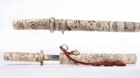 Lot 289 - TWO JAPANESE CARVED BONE DAGGERS with figural...