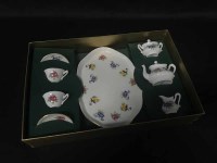 Lot 355 - CROWN STAFFORDSHIRE MINIATURE TEA SERVICE...