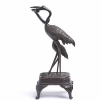 Lot 321 - JAPANESE BRONZE CRANE GROUP showing a crane...