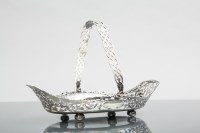 Lot 267 - LATE VICTORIAN PIERCED SILVER BASKET maker...