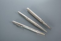 Lot 337 - THREE SILVER MECHANICAL PENCILS comprising a...