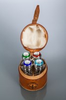 Lot 354 - SET OF FOUR EDWARDIAN SILVER ENAMELLED SCENT...