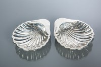 Lot 380 - PAIR OF SMALL SILVER SCALLOPED DISHES maker...