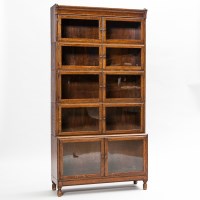 Lot 752 - THREE OAK SECTIONAL BOOKCASES the five...