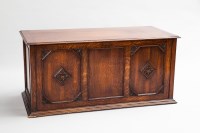 Lot 754 - OAK PANELLED BLANKET CHEST with carved floral...