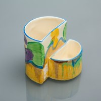 Lot 505 - CLARICE CLIFF BIZARRE WARE VESTA HOLDER...