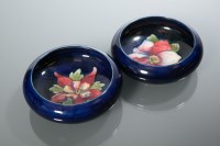 Lot 519 - TWO MOORCROFT PIN DISHES including an 'anenome'...