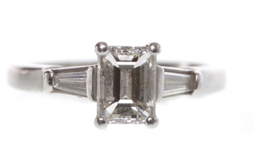 Lot 12 - PLATINUM DIAMOND SOLITAIRE RING set with a...