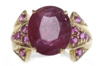 Lot 158 - EIGHTEEN CARAT GOLD RUBY RING set with a large...