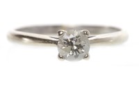 Lot 162 - DIAMOND SOLITAIRE RING with a four claw set...