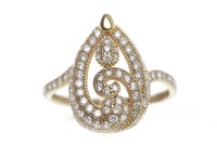 Lot 200 - GEM SET DRESS RING with an openwork pear...