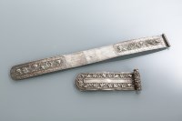 Lot 200 - TWO CHINESE SILVER PAGE TURNERS each embossed...