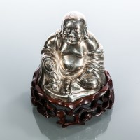 Lot 201 - CHINESE SILVER BUDDHA the figure seated and...