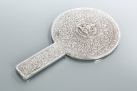 Lot 209 - STRAITS CHINESE SILVER HANDMIRROR embossed...