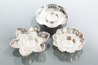 Lot 212 - GROUP OF THREE CHINESE SILVER CANDLE STANDS...