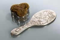 Lot 224 - CHINESE SILVER HANDMIRROR embossed with a...