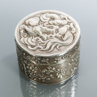 Lot 231 - CHINESE SILVER CIRCULAR BOX the lid embossed...