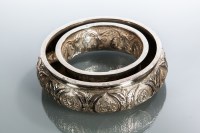 Lot 253 - STRAITS CHINESE SILVER FLOWER RING embossed...