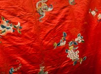 Lot 261 - CHINESE SILK EMBROIDERY with floral motifs and...