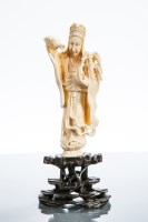 Lot 269 - CHINESE IVORY CARVING modelled as a female...