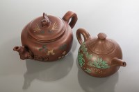 Lot 308 - TWO CHINESE YI XING TEA POTS one with fish...