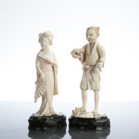 Lot 435 - TWO JAPANESE IVORY FIGURES one modelled as a...