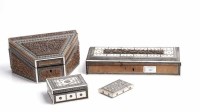 Lot 857 - THREE CARVED SANDELWOOD BOXES each inlaid with...