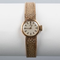 Lot 1607A - LADY'S NINE CARAT GOLD OMEGA WRISTWATCH WITH...