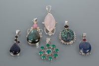 Lot 1634 - A COLLECTION OF SIX HARDSTONE SILVER PENDANTS...