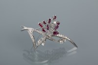 Lot 1651 - RUBY AND DIAMOND FLORAL SPRAY BROOCH set with...