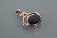 Lot 1657 - NINE CARAT GOLD FOB one side with blue glitter...