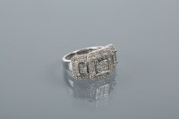 Lot 1666 - DIAMOND CLUSTER DRESS RING set with three...