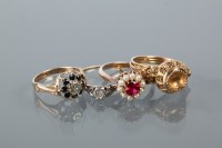Lot 1671 - COLLECTION OF FOUR NINE CARAT GOLD RINGS...