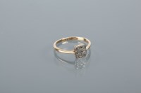 Lot 1679 - DIAMOND CLUSTER RING the rectangular bezel set...