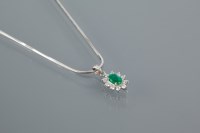 Lot 1699 - EMERALD AND DIAMOND CLUSTER PENDANT the...