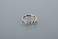 Lot 1701 - DIAMOND FIVE STONE RING the five brilliant cut...