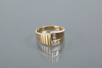Lot 1707 - UNUSUAL DIAMOND DRESS RING set with a baguette...