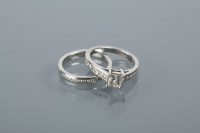 Lot 1709 - DIAMOND SOLITAIRE RING the central square cut...